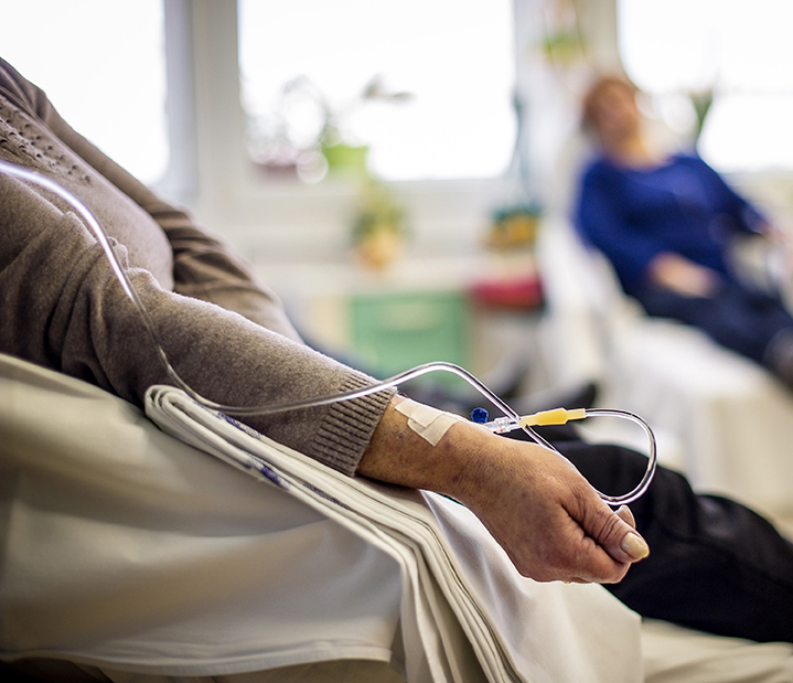 Cancer patients receiving chemotherapy treatment in a hospital.